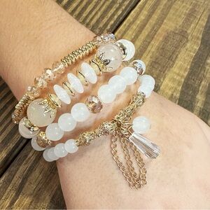Lovely gold and white layered bracelets